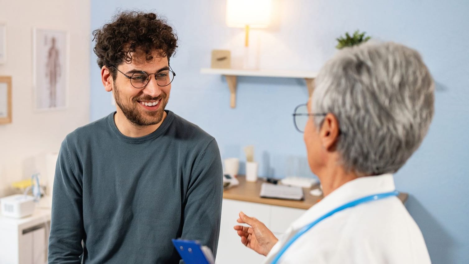 Patient consulting with doctor about PKV changes