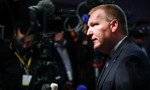 EU Justice Commissioner Michael McGrath advocating for direct regulation over directives