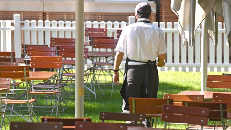 Restaurant interior showing empty tables