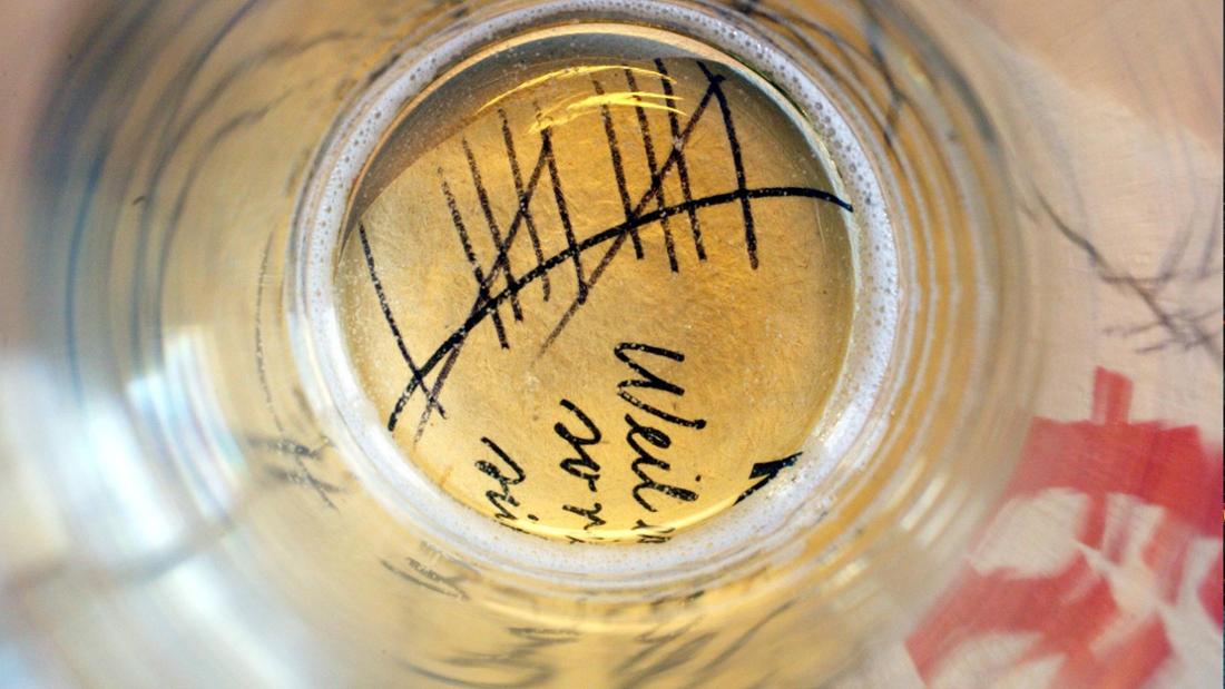 STRICHLISTE AUF EINEM BIERDECKEL