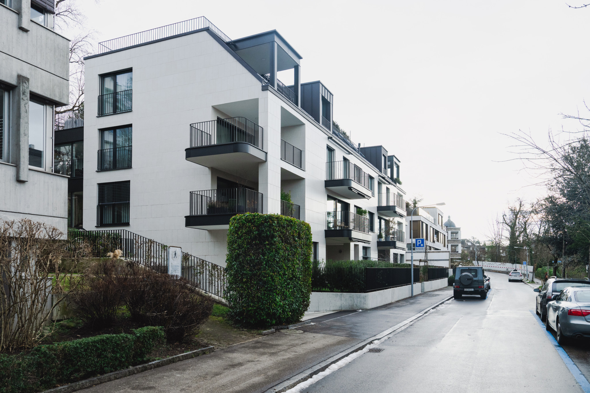Modern residential building of the real estate company Xania on Attenhoferstrasse 11 with balcony