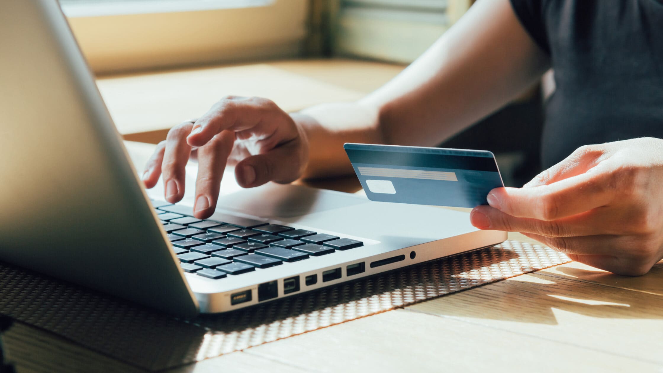 A close-up view of an Austrian bank statement and digital banking interface on a smartphone